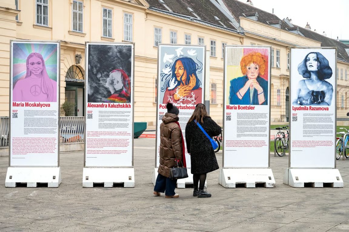 Passersby look at the exhibit in Vienna, 9 December 2025. Photo: Feminist Anti‑War Resistance