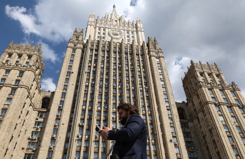 A man walks past the Russian Foreign Ministry building in Moscow, 16 May 2025. Photo: EPA/MAXIM SHIPENKOV